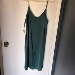 Forrest green flowy knee length dress. Perfect for layering.